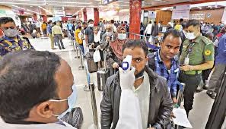 A file photo shows incoming passengers being checked with a hand-held scanner at the Hazrat Shahjalal International Airport in the capital amid the global coronavirus outbreak. The Bangladesh Bank on Sunday issued guidelines, asking the country’s scheduled banks to introduce deposit products in the taka for non-resident Bangladeshis with a view to encouraging the NRBs to save their money in the country. — New Age photo