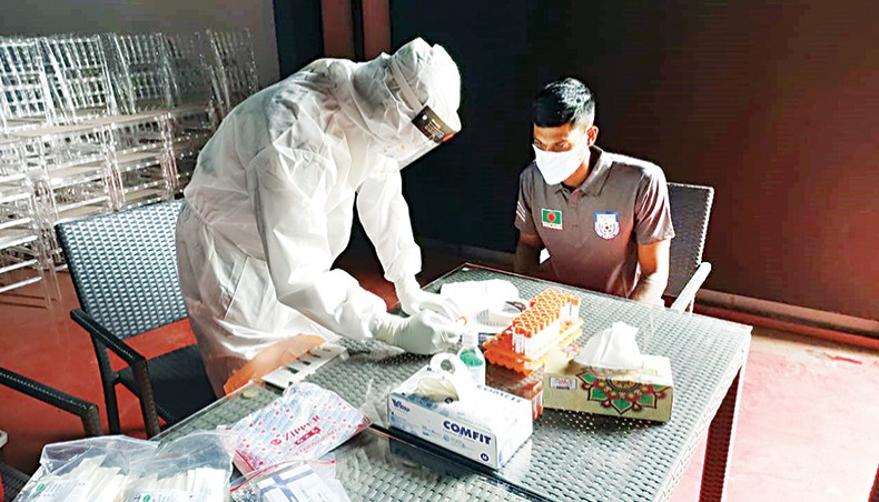 A member of the Bangladesh national football team gives sample for COVID-19 test at the Sarah Resort in Gazipur on Monday. — BFF photo