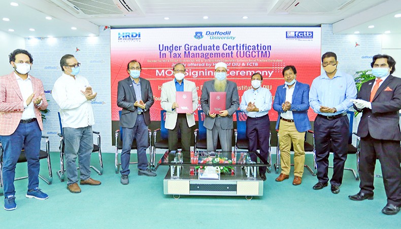 DIU acting VC, FCTB president and other officials pose for a photograph during MoU signing ceremony at Daffodil International University in Dhaka on Sunday. — Press release