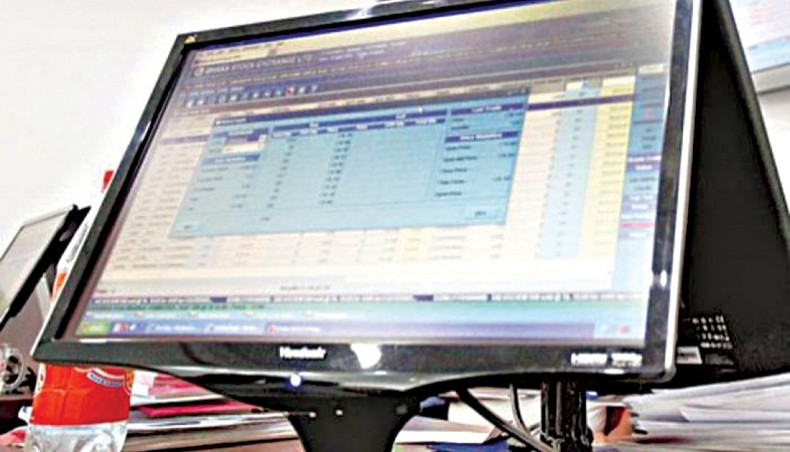 A file photo shows a computer screen displaying the share price movements at a brokerage house in Dhaka. Dhaka stocks soared on Wednesday after a slight fall in the previous session as investors continued buying shares, especially those of financial and large-capitalised scrips amid their growing confidence in the market and the gradual reopening of economy despite the coronavirus outbreak in the country.— New Age pho