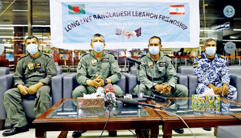 Bangladesh Air Force Group Captain Santanu Chowdhury flanked by BAF officers brief journalists on Wednesday about their humanitarian mission to Lebanon that carried aid for victims of explosion-ravaged Beirut. — New Age photo