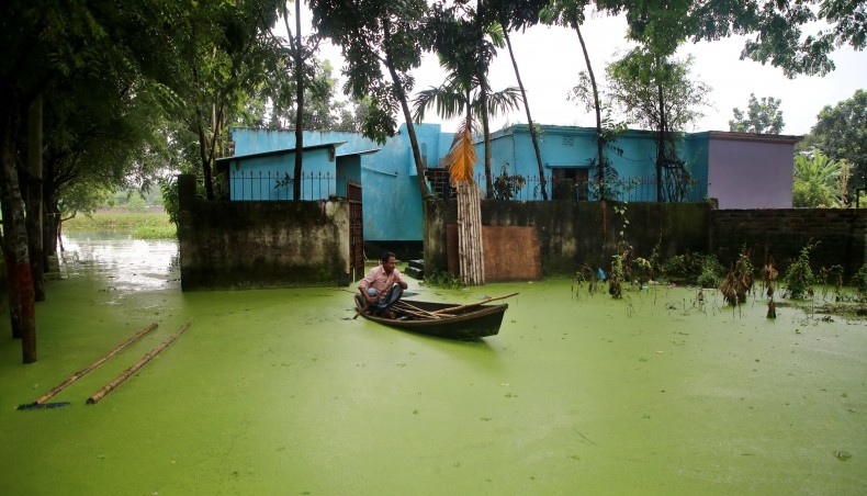 A flooded house near Bangladesh capital Dhaka. The photo was taken recently. - New Age photo