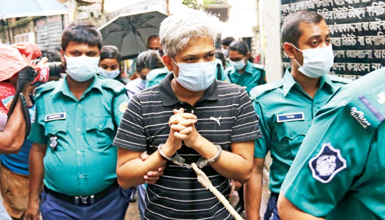 Police takes JKG Health Care chief executive officer Ariful Islam Chowhury to a Dhaka metropolitan magistrate court for COVID-19 certificate forgery on Thursday. — New Age photo