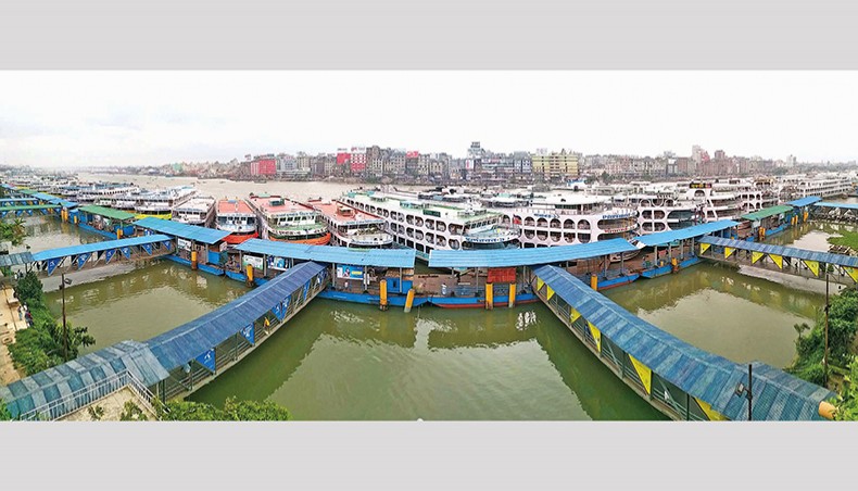 Motor vessels remain berthed at Sadarghat launch terminal in Dhaka on Wednesday as the authorities concerned suspends launch movement due to inclement weather on Wednesday. — Sony Ramany