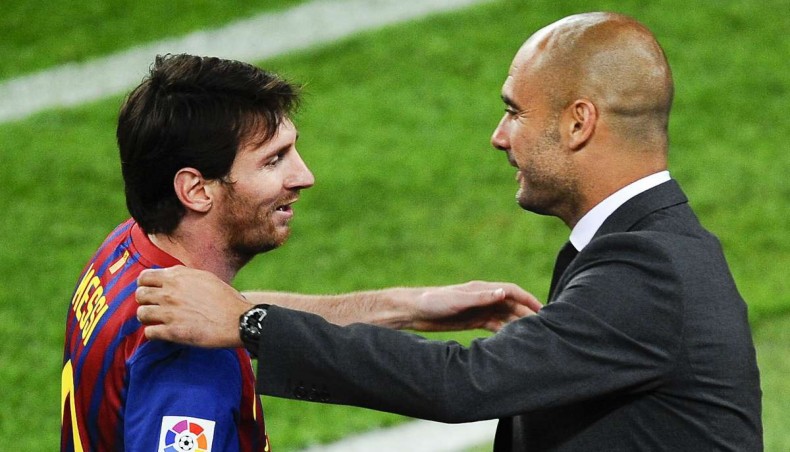 Lionel Messi is seen with Pep Guardiola. -- AFP photo