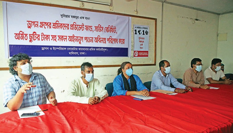 Bangladesh Trade Garment Workers Union Centre international affairs secretary Monzur Moin speaks at a press conference held to announce programmes to be held by terminated workers of Dragon Group in the capital on Saturday. Dragon Group Shramik Karmachari Sangram Committee coordinator Abdul Kuddus, BTGWUC general secretary Joly Talukder and former general secretary Sadekur Rahman Shamim were also present, among others. — New Age photo