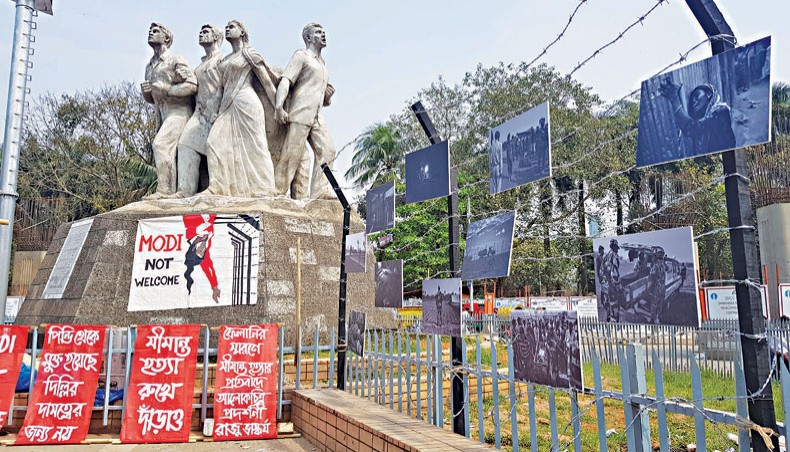 Photos of border killing incidents and a drawing of Felani’s body, hanging from the Indian border fence after being shot dead by BSF, are in display in a photo exhibition by Parvez Ahmed Rony at the Dhaka University campus on March 6 in support of the then ongoing sit-in protest by Nasir Abdullah there against border killings. — New Age photo