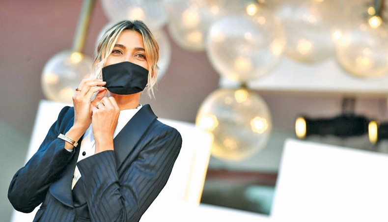 Master of Ceremonies and sponsor of the 77th Venice Film Festival, Italian actress Anna Foglietta wears a face mask as she poses during a photocall on the red carpet outside the festival’s palace, on the eve of the festival’s opening, on September 1, 2020 at Venice Lido. — AFP photo