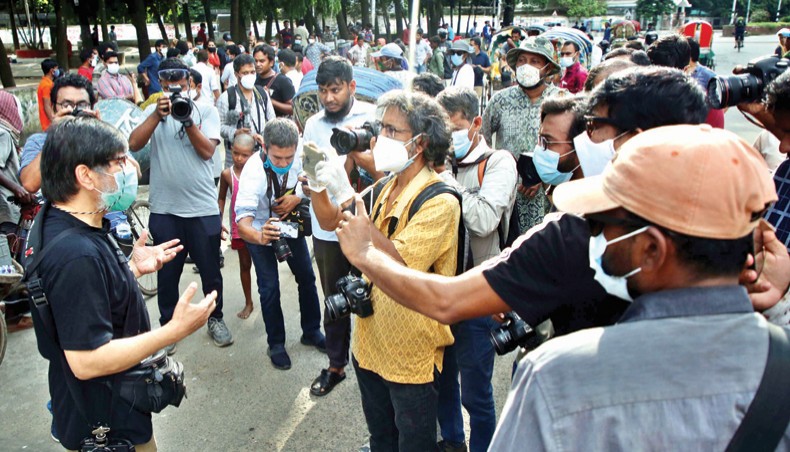 Drik managing director Shahidul Alam speaks to the media during a programme marking its founding anniversary at Dhaka University on Friday. — New Age photo