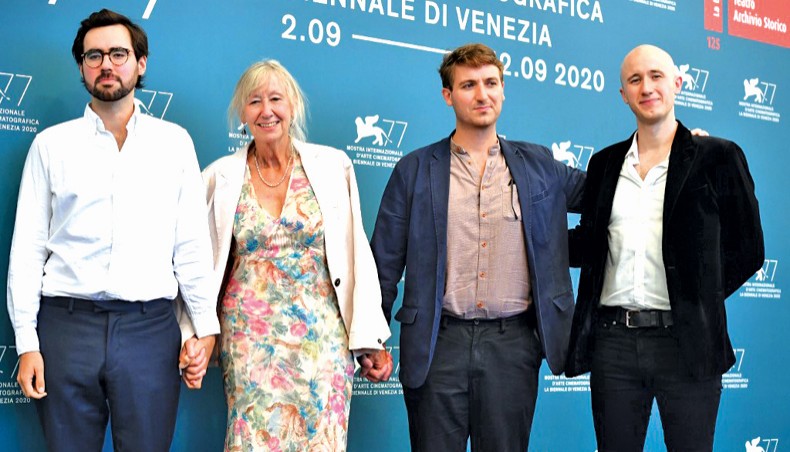The widow of late British director Luke Holland, Yvonne Hennessy (2ndL), her sons Zefi Hennessy Holland (L) and Hugh Hennessy Holland (C) and executive producer Sam Pope attend a photocall for the film ‘Final Account’ presented out of competition on the second day of the 77th Venice Film Festival, on September 3, 2020. — AFP photo