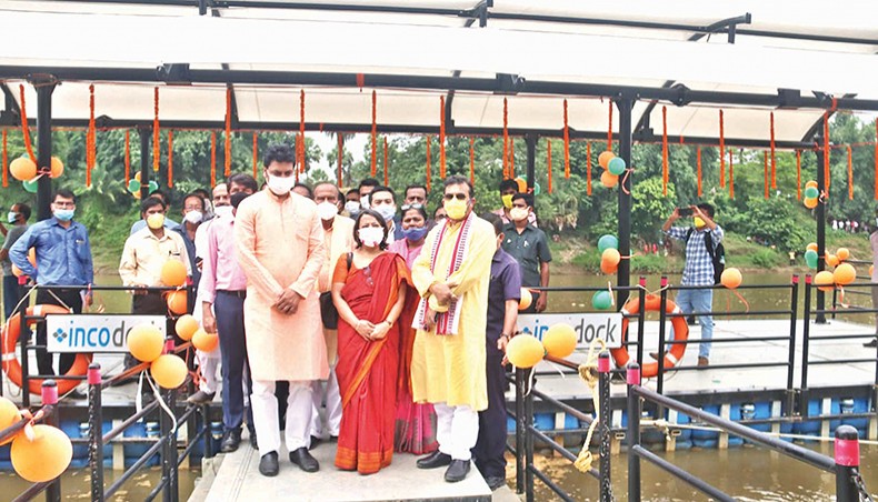Tripura chief minister Biplab Kumar Deb and Indian high commissioner to Bangladesh Riva Ganguly Das receive a cargo at Sonamura in Tripura on Saturday after Bangladesh-India waterway trade was launched through River Gumti route. — New Age photo
