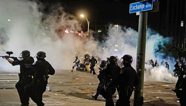 Rochester Police use Pepper spray and tear gas as protesters gather in Rochester, New York, on Saturday, on the fourth night of protest following the release of video showing the death of Daniel Prude. Prude, a 41-year-old African American who had mental health issues, died of asphyxiation after police arrested him on March 23, in Rochester. — AFP photo