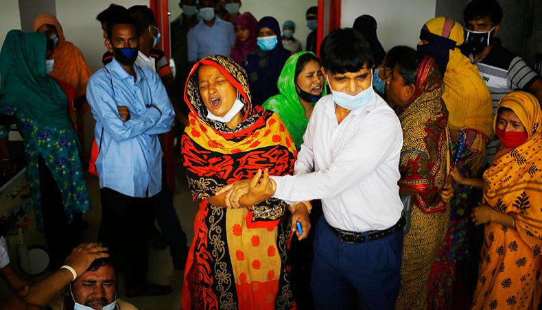 Relatives wail after the death of a Narayanganj mosque fire victim at the Sheikh Hasina National Institute of Burn and Plastic Surgery in Dhaka on Monday. — Sourav Lasker