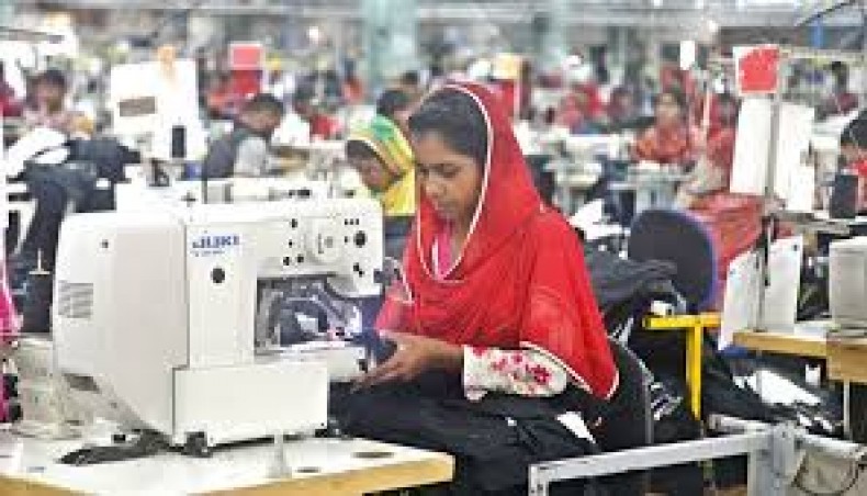 A file photo shows workers are busy at a garment factory on the outskirts of Dhaka.- New Age photo