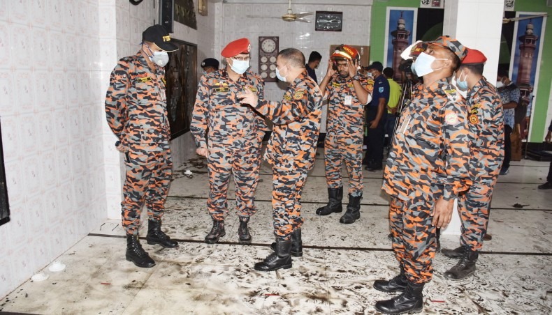 Firefighters inspect the Narayanganj mosque after blast on September 6. - New Age photo