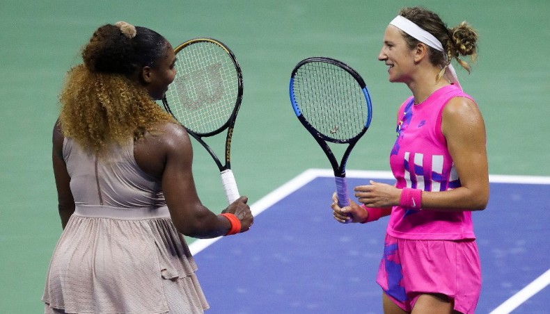 Victoria Azarenka (R) of Belarus talks with Serena Williams (L) of the United States after winning their US Open women's singles semi-final match at the USTA Billie Jean King National Tennis Centre in New York on Thursday. — AFP photo