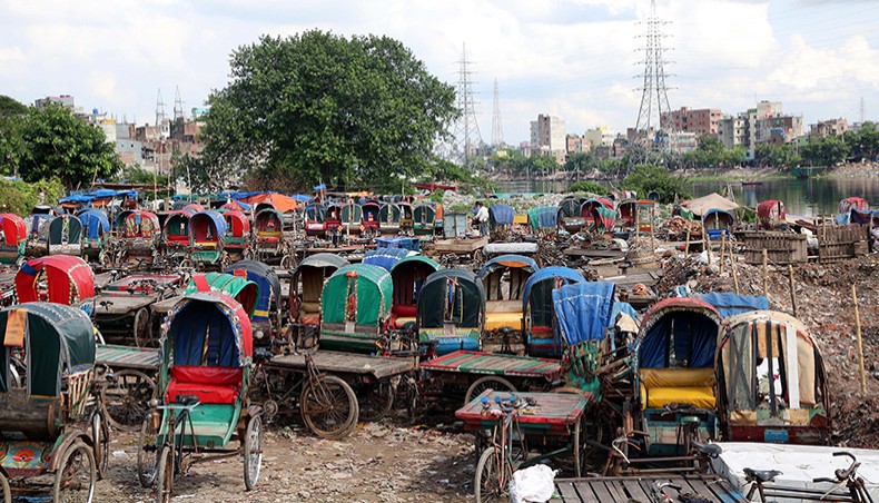 A rickshaw garage has been set up occupying a portion of the Buriganga land at Lalbagh in Dhaka. This photo was taken on Saturday. — Sony Ramany
