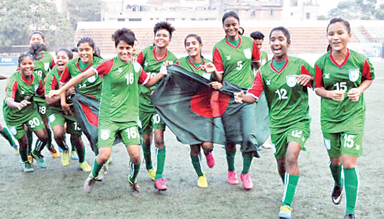 A file photo shows Bangladesh women’s football team players celebrating after winning a match. — BFF photo