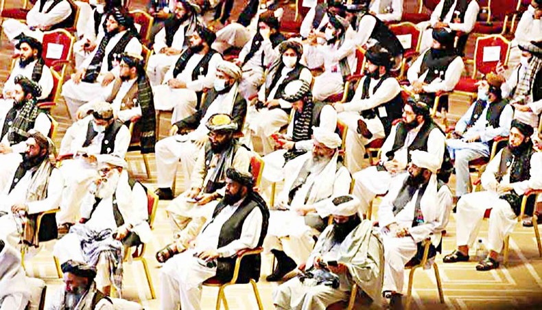 Members of the Taliban delegation attend the opening session of the peace talks between the Afghan government and the Taliban in Doha, Qatar, on September 12, 2020. — Qantara