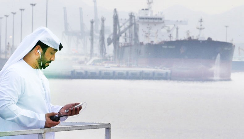 An Emirati man stands at the oil terminal of Fujairah during the inauguration ceremony of a dock for supertankers on September 21, 2016. Saudi Arabia’s energy minister on Thursday pressed oil cartel OPEC and its allies to comply fully with production cuts amid falling crude prices, insisting that doing so was ‘not an act of charity’. — AFP photo
