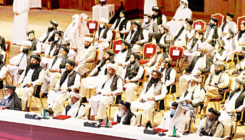 Members of the Taliban delegation attend the opening session of the peace talks between the Afghan government and the Taliban in the Qatari capital Doha on September 12. — Agence France-Presse/Karim Jaafar