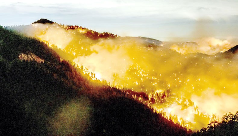 The Bobcat Fire continues to burn through the Angeles National Forest in Los Angeles County, north of Azusa, California, on September 17. — Agence France-Presse/Kyle Grillot
