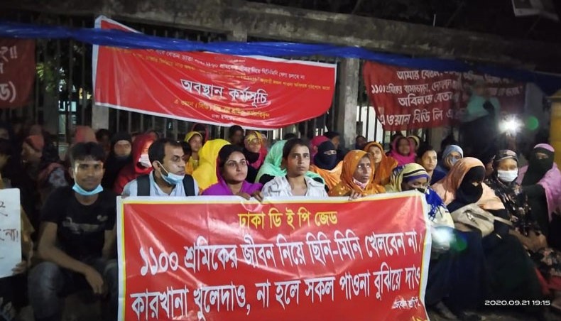 More than 1,100 workers of A One Garment of Dhaka Export Processing Zone begin a sit-in programme demanding arrears and resumption of the factory on Monday. — New Age Photo