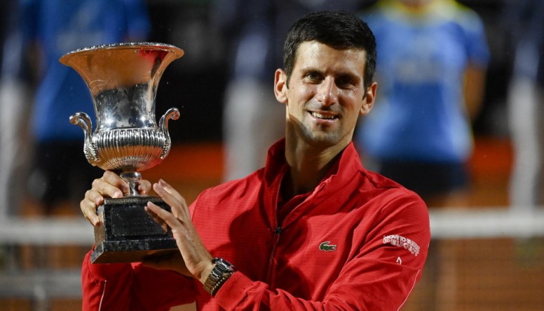 Serbia's Novak Djokovic poses with his trophy after defeating Argentina's Diego Schwartzman in the Italian Open final at the Foro Italico in Rome on Monday. — AFP photo