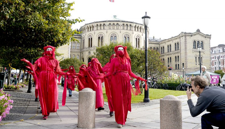 Members of the climate movement Extinction Rebellion demonstrate outside the Storting to protest against the government’s oil policy on September 21 in Oslo. — Agence France-Presse/NT Scanpix/Gorm Kallestad