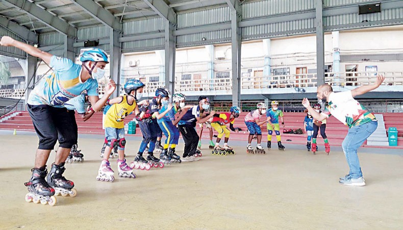 Bangladesh national roll ball team head coach Ashraful Alam Masum (R) trains a group of skater at the Sheikh Russel Roller Skating Complex on Friday. — Sourav Lasker