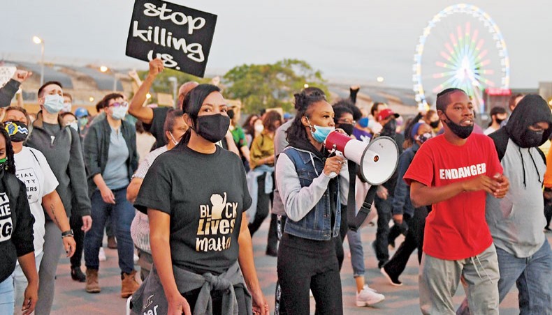 Protestors demonstrate in the streets during a protest action on Thursday in St Louis, Missouri. Protests have been taking place nationwide in response to the Kentucky grand jury’s determination of no charges were brought against the officers related to the death of Breonna Taylor. — AFP photo