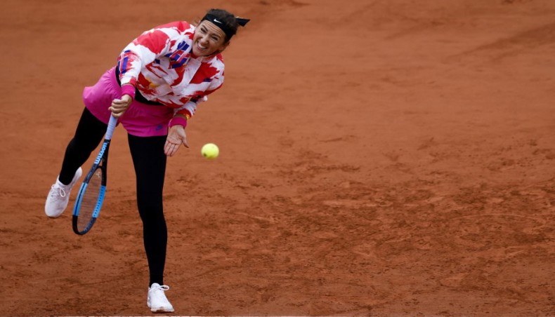 Belarus' Victoria Azarenka serves the ball to Montenegro's Danka Kovinic during their French Open women's singles first round match at the Suzanne Lenglen court at Roland Garros in Paris on Sunday.— AFP photo