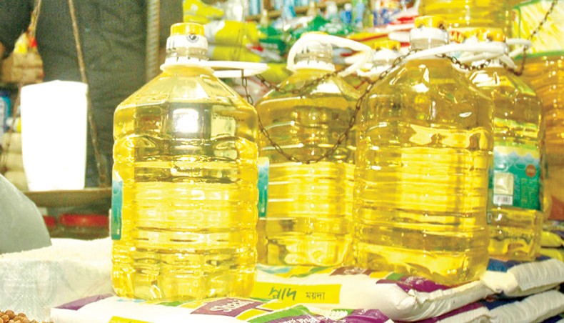 A file photo shows bottled soya bean oil at a shop in Dhaka. The government has taken the initiative to review wages for workers and employees working in the country’s vegetable oil mills after nine years of the last revision. — New Age photo