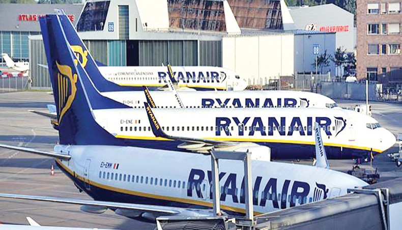 A file photo shows Ryanair aircrafts sitting on the tarmac at the airport of Bremen. With the coronavirus crisis putting a chill on travel, European airlines are reducing fares to attract passengers and fill the planes that are still flying. — AFP photo