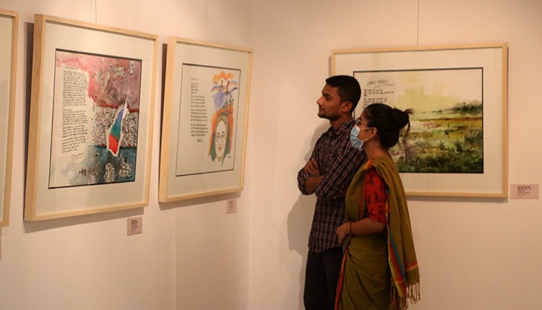 Visitors look at displayed paintings at gallery 4 of National Art Gallery. — New Age photo