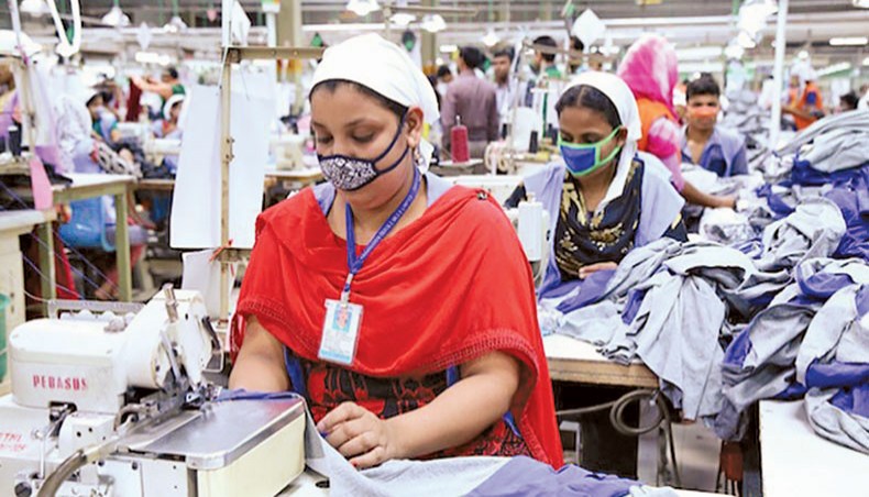A file photo shows female workers sewing clothes at a readymade garment factory in Dhaka. Seventy-seven per cent of the readymade garment factory workers in Bangladesh found it difficult to feed everyone in their household because of job loss or wage cut amid the coronavirus outbreak in the country, according to a recent survey.— New Age photo