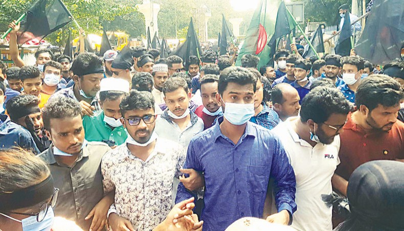 Former DUCSU VP Nurul Haque Nur leads a procession organised by Students-people Against Rape and Repression at Shahbagh in Dhaka on Wednesday. — New Age photo