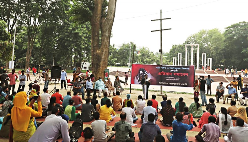 Sammilita Sangskritik Jote organises a programme protesting at rape and violence against women on Central Shaheed Minar premises on Saturday. — New Age photo