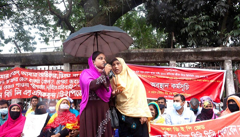 Workers of A-One Garment Ltd stage a sit-in protest in front of the National Press Club in Dhaka demanding their unpaid wages on September 22. — Taslima Akhter