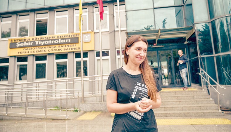 Actress Ruges Kirici speaks to media in front of Istanbul metropolitan municipality theater building after Turkish authorities banned a Kurdish-language play at Gaziosmanpasa district in Istanbul on October 13, 2020. — AFP photo