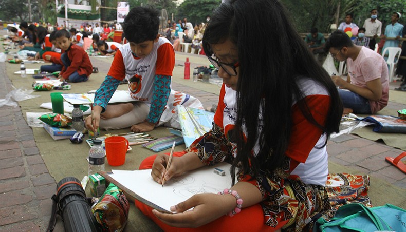 Children take part in a drawing contest organised to mark the birth anniversary of Sheikh Russel, the youngest son of the country’s founding president Sheikh Mujibur Rahman, at the South Plaza of the Jatiya Sangsad building in Dhaka on Sunday. — New Age photo