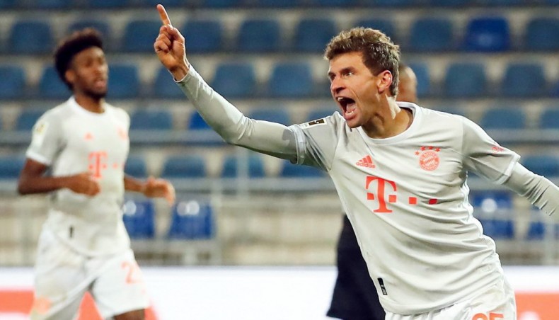 Bayern Munich forward Thomas Muller celebrates after scoring against DSC Arminia Bielefeld during their Bundesliga match at the SchuecoArena in Bielefeld on October 17, 2020.— AFP photo