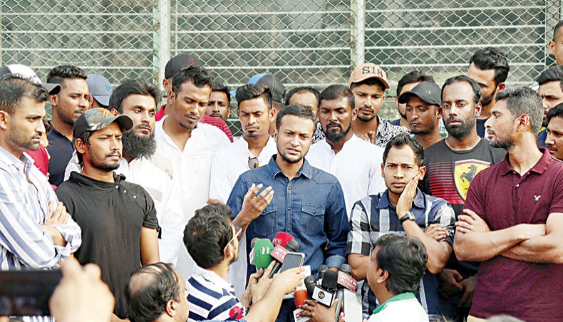 A file photo from October 21, 2019 shows Bangladesh national cricket team captain Shakib Al Hasan (C) speaking with reporters next to team-mate Mushfiqur Rahim (R) in front of the National Cricket Academy Ground at Mirpur. — New Age photo