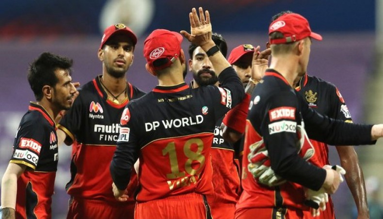 Royal Challengers Bangalore pacer Mohammed Siraj (C) celebrates one of his three wickets against Kolkata Knight Riders during their Indian Premier League match in Abu Dhabi on Wednesday. — IPL photo