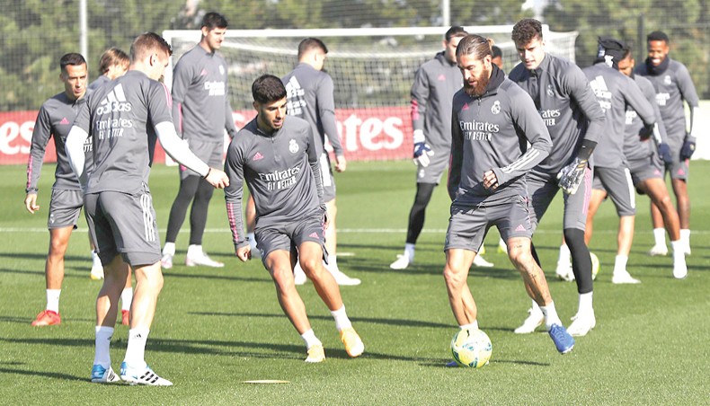 Real Madrid players attend a training session at the club’s Valdebebas training facilities in Madrid on Friday. --Twitter photo
