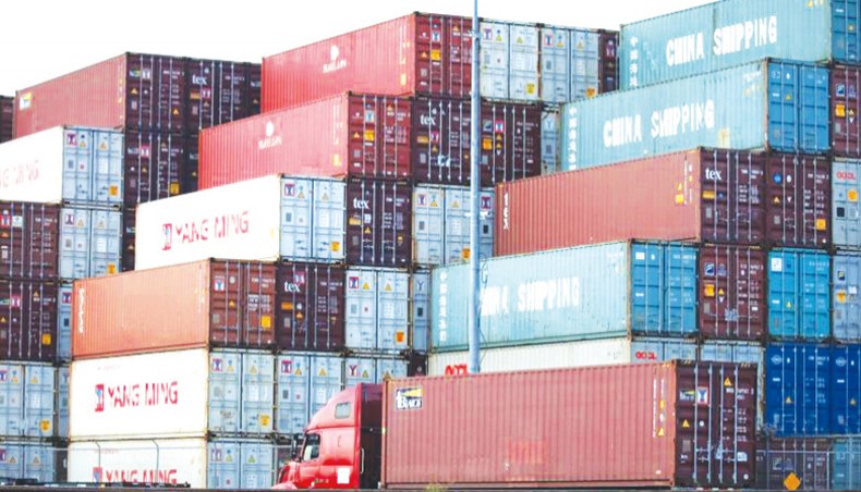 A file photo shows shipping containers stacked at the Port of Los Angeles, in California. — AFP photo