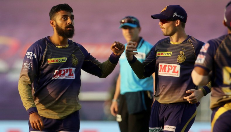 Kolkata Knight Riders spinner Varun Chakravarthy (L) celebrates one of his five wickets against Delhi Capitals during their Indian Premier League match in Abu Dhabi on Saturday. — IPL photo