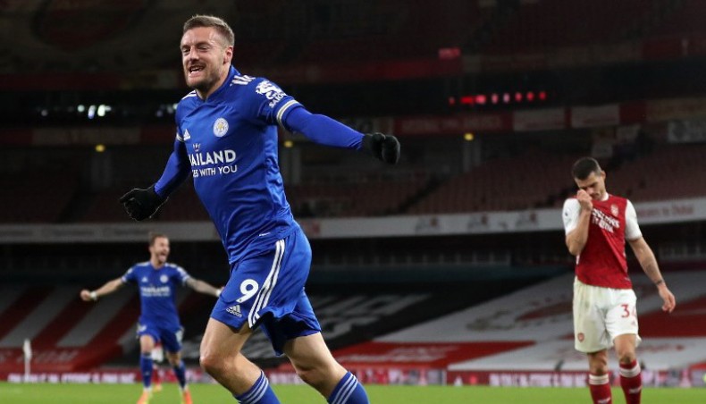 Leicester City striker Jamie Vardy celebrates after scoring his team’s opening goal against Arsenal during their Premier League match at the Emirates Stadium in London on Sunday. — AFP photo