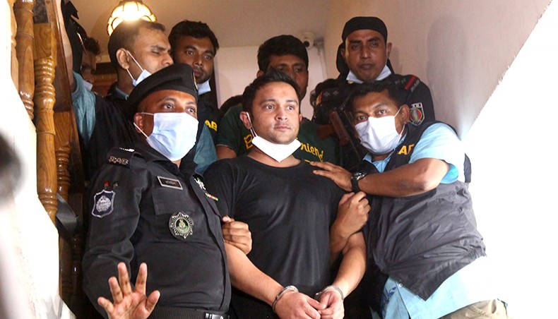 The Rapid Action Battalion detains Irfan Selim, son of Dhaka-7 MP Md Selim, at their residence at Swarighat in Old Dhaka on Monday on charge of assaulting a Bangladesh Navy officer. — Sourav Lasker