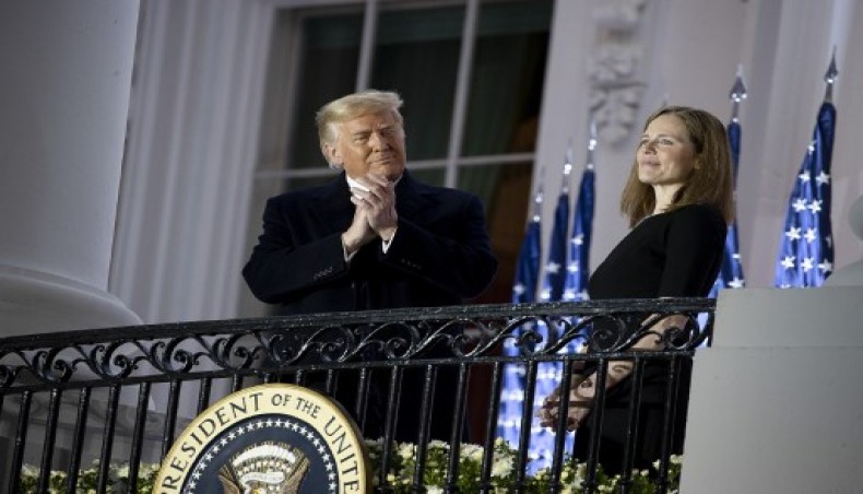 US president Donald Trump stands with newly sworn in U.S. Supreme Court Associate Justice Amy Coney Barrett during a ceremonial swearing-in event on the South Lawn of the White House October 26, 2020 in Washington, DC- AFP photo